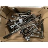 A box of kickstart and other levers including Velocette LE.