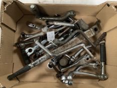 A box of kickstart and other levers including Velocette LE.