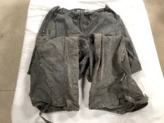 A pair of well worn Trialmaster wax trousers.