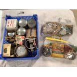 A box of various pistons and two bags of various piston rings.