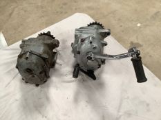 Two gearboxes, one appears complete.