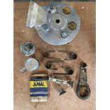 A quantity of engine parts for a Manx Norton and a brake plate for a BSA Gold Star, plus brake shoes