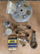 A quantity of engine parts for a Manx Norton and a brake plate for a BSA Gold Star, plus brake shoes