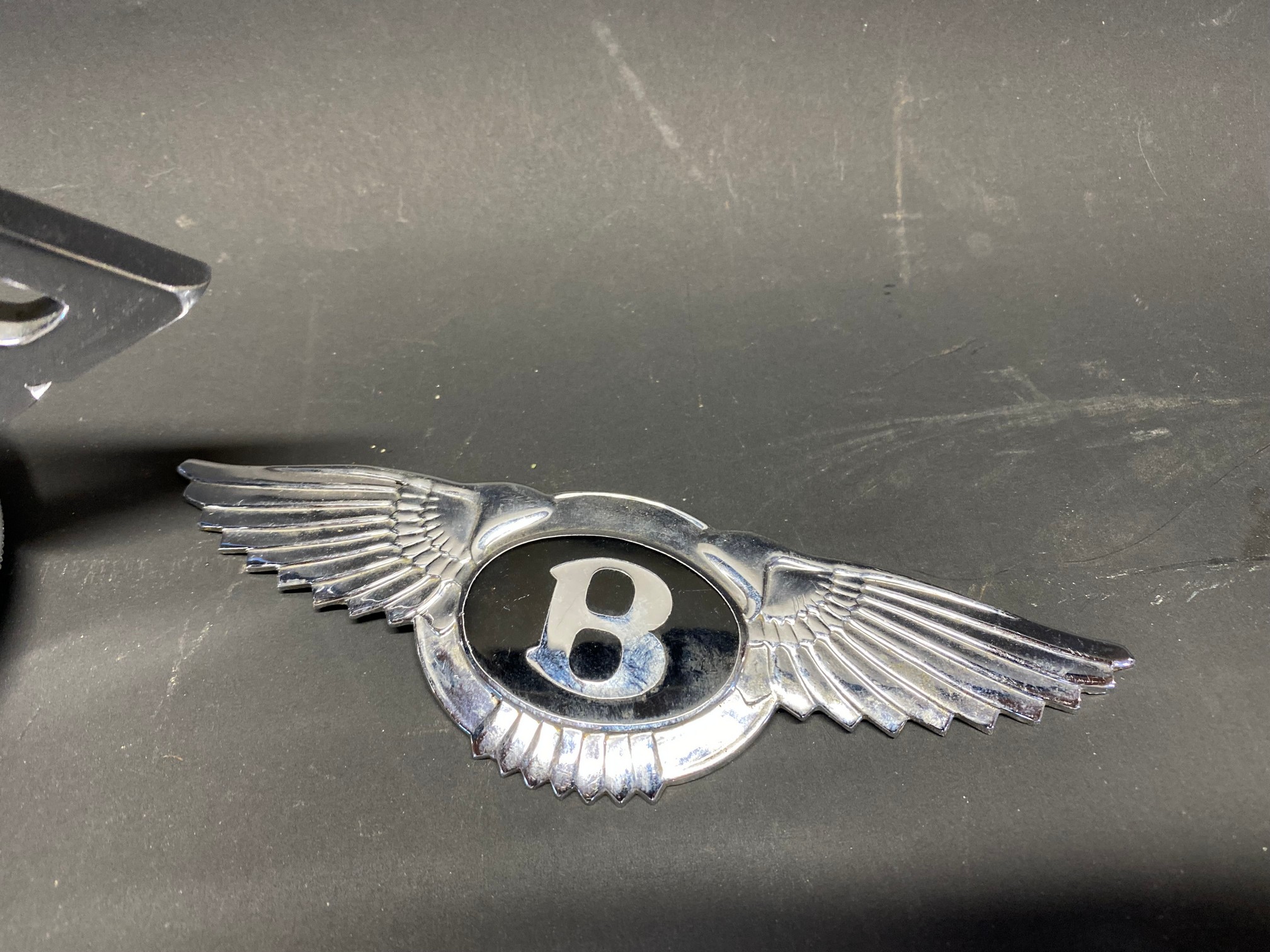 A Bentley 'B' radiator mascot on a radiator cap plus a boat badge. - Image 3 of 3