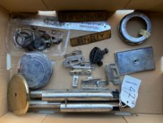 A box of assorted car parts including Rolls-Royce and Bentley.