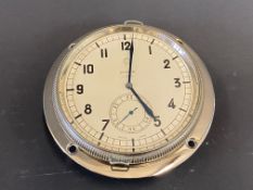 A Zenith eight day car clock with secondary dial, appears restored.