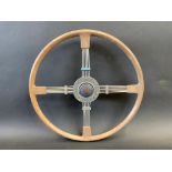 A Bluemel's Brooklands steering wheel with Vauxhall Motors centre, probably added later.