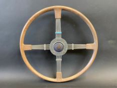 A Bluemel's Brooklands steering wheel with Vauxhall Motors centre, probably added later.