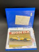A quantity of mostly A4 sized photographs of racing cars, road cars and motorcycles, colour and