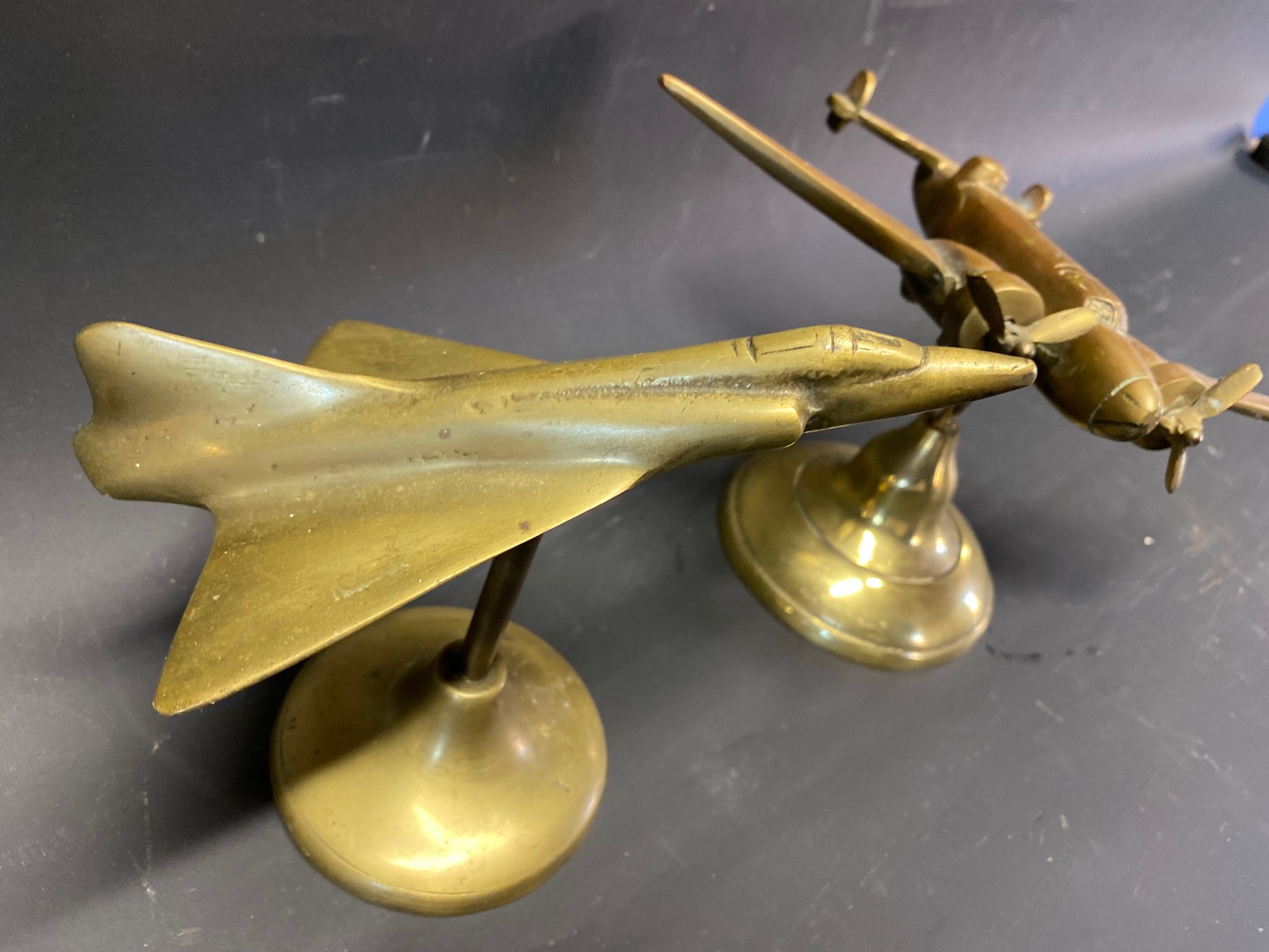 Two mascots/desk pieces the form of a brass aeroplanes, a Lockheed Hudson and a Delta winged jet. - Image 2 of 3