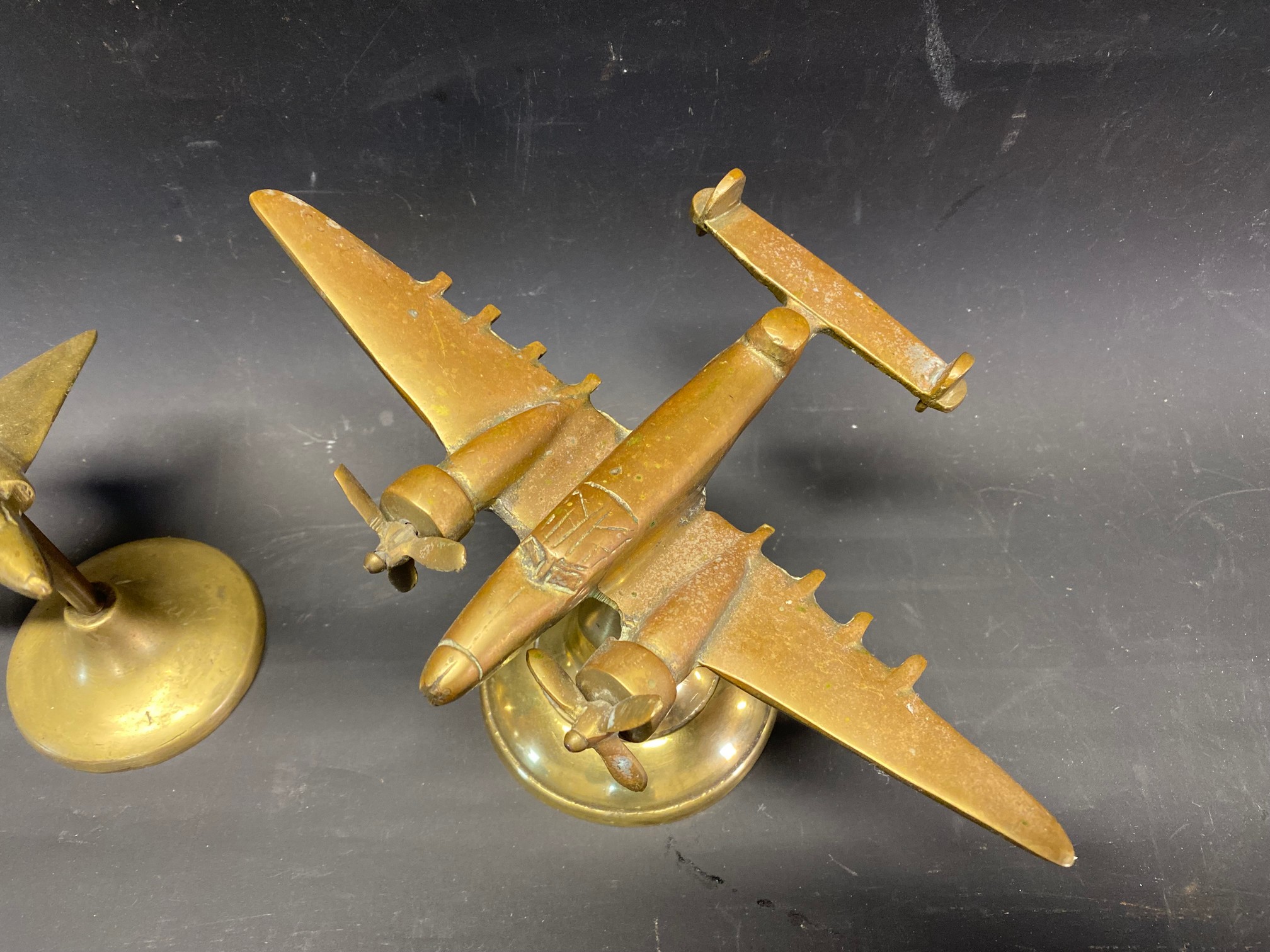 Two mascots/desk pieces the form of a brass aeroplanes, a Lockheed Hudson and a Delta winged jet. - Image 3 of 3