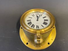 A Doxa rim-wind eight day car clock with sloping mount for Veteran or Edwardian car.