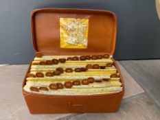 A tan leather cased set of maps of France.