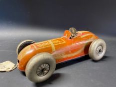 A Mar Toys British clockwork tinplate model of a single seater racing car.