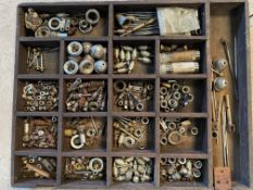 A tray of small parts relating to lamps, carburettors etc.