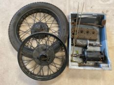 Two Austin 7 wheels, an Austin 7 cylinder head plus two starter motors etc.