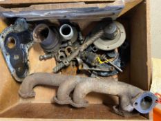 A box of mostly Austin 12/4 parts to include a circa 1928 manifold.