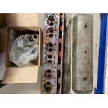 An Alvis 6-cylinder head, rocker cover, a camshaft and a box of 6-cylinder parts.