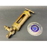 A good quality brass cylindrical pressurised fuel cylinder plus a Ford Main Dealership supply plate.