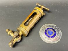 A good quality brass cylindrical pressurised fuel cylinder plus a Ford Main Dealership supply plate.