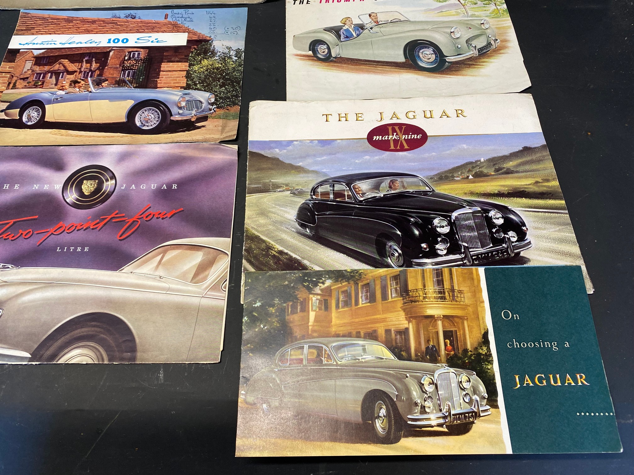 A selection of car brochures mainly relating to British sports cars from the 1950s and 60s including
