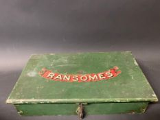 A wooden lidded box bearing the brand name of Ransomes, containing a selection of metal and