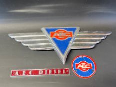 An AEC commerical vehicle chrome plated name plate and two others.