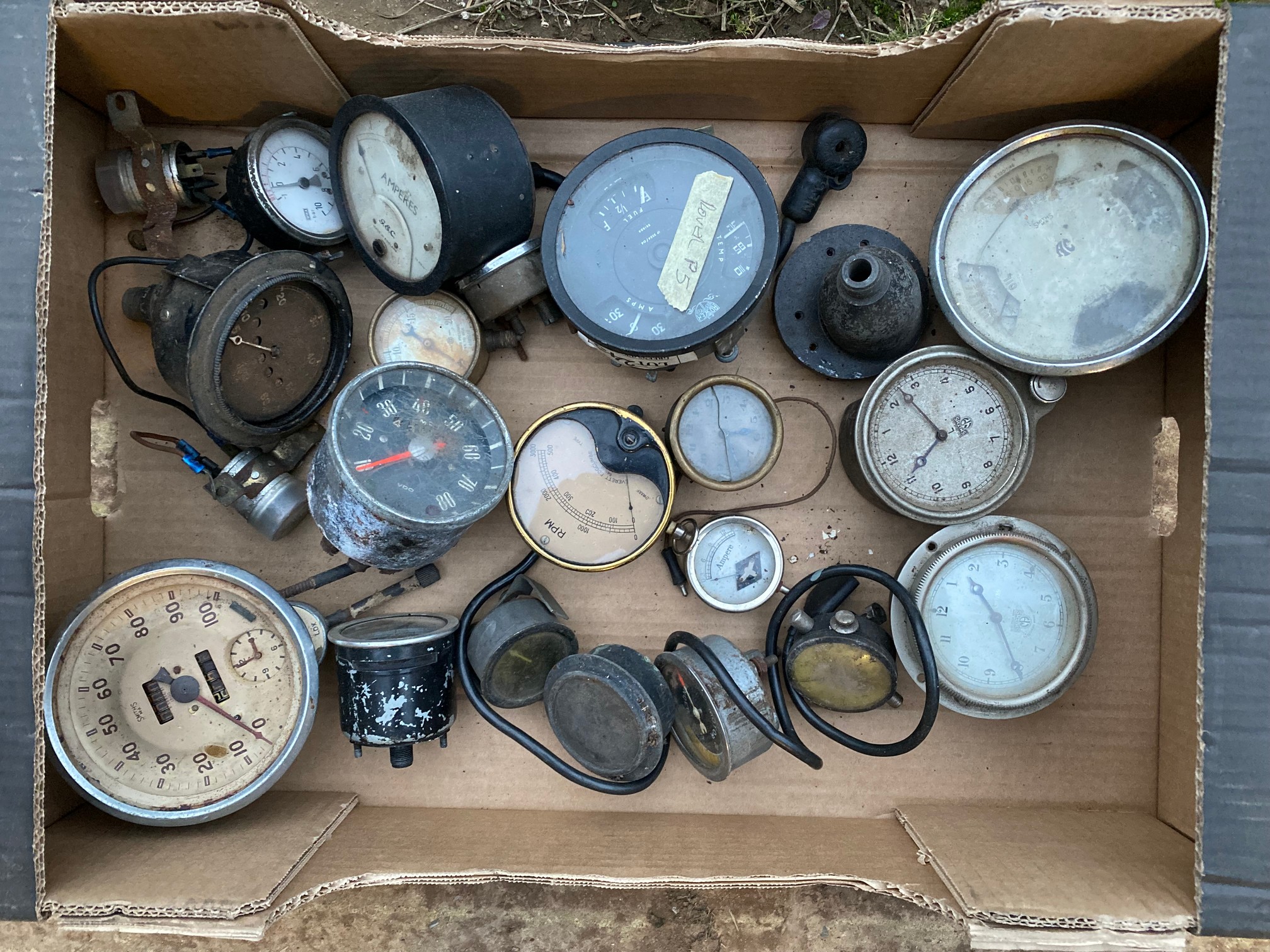 A box of assorted instruments and dials.