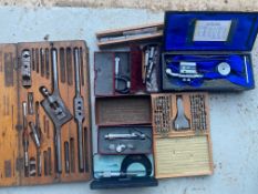 A quantity of workshop precision tools including a micrometer, letter punches etc.