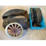 An autojumbler's lot of various early parts including a rear mudguard, hickory wheel etc.