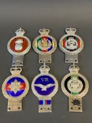 Six Gaunt enamel regimental car badges to include Royal Hampshire Regiment.