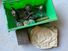 A small crate of parts and collectables including a leather cap, a CAV bulb case etc.