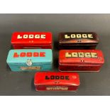 Five Lodge spark plug tins in good condition.