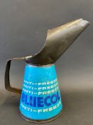 A Bluecol Anti-Freeze quart measure.