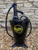 A garage forecourt greaser, restored in black with a handpainted Pratts logo.