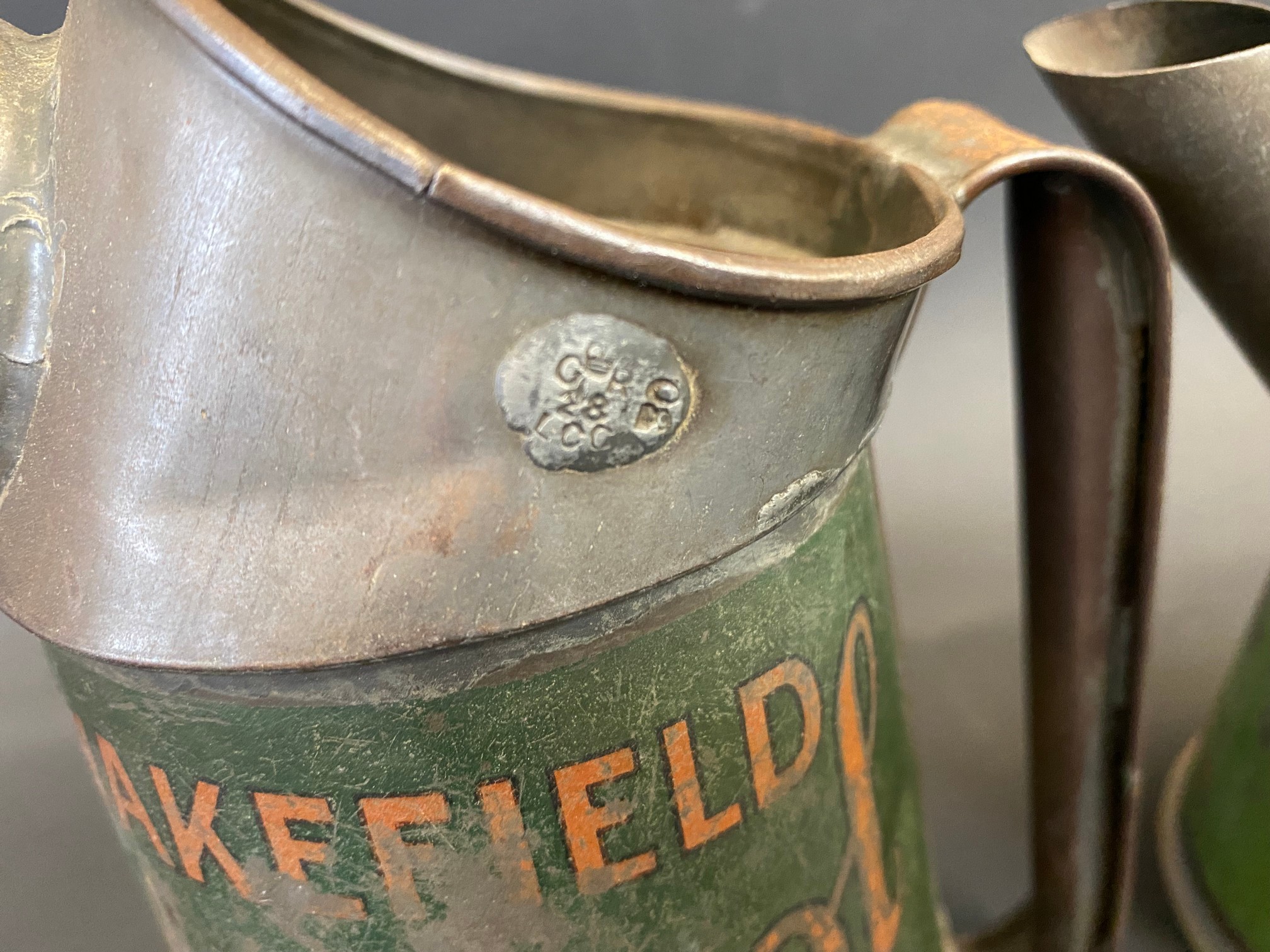 A Wakefield Castrol quart oil measure and a pint similar. - Image 4 of 6