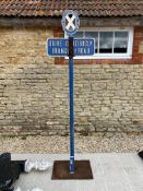 A Scottish Automobile Club oval pediment on a pole, with cast iron sign below bearing the words '