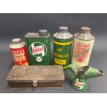 A box of assorted oil cans including Shell and BP.