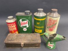 A box of assorted oil cans including Shell and BP.