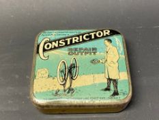 A rare Constrictor puncture repair outfit tin, in good condition.