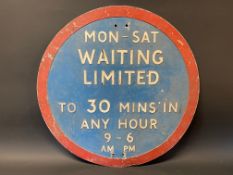 A circular Waiting Limited road sign, 24" diameter.