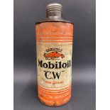 A Gargoyle Mobiloil CW Grade quart cylindrical oil can.