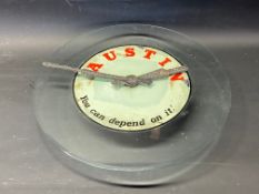 A rare Austin 'You Can Depend on It' circular advertising wall clock with original hands and motor.