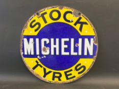 An early Michelin Stock Tyres circular double sided enamel sign, 21" diameter.