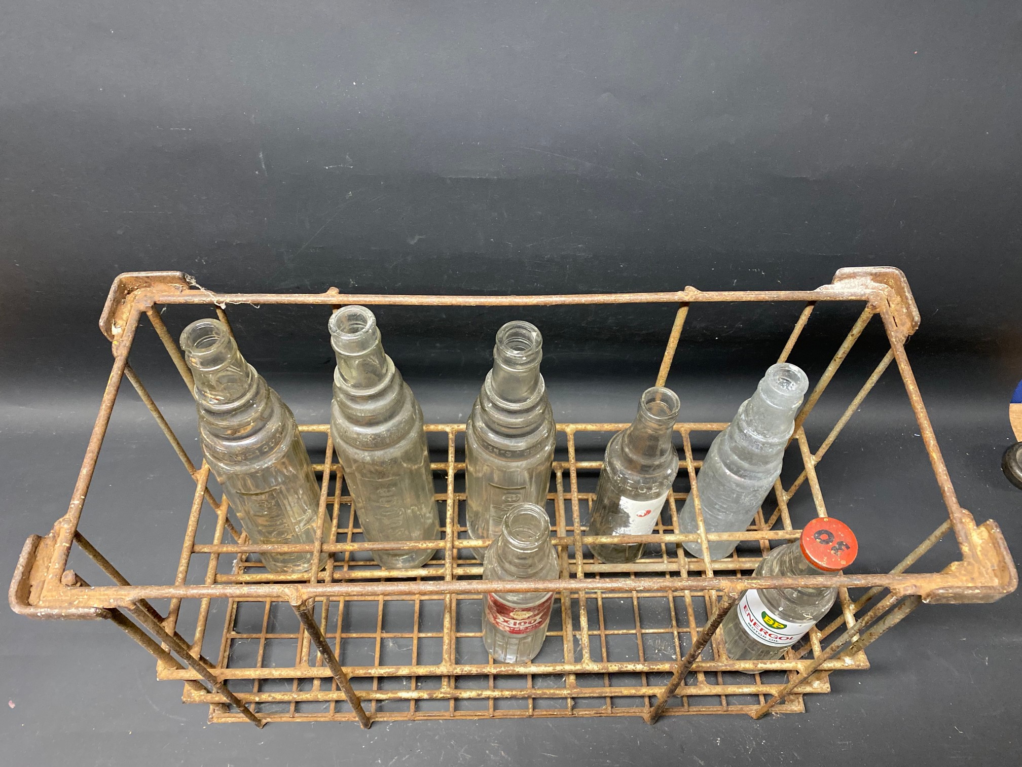 A 10 division oil bottle crate containing an assortment of oil bottles. - Image 2 of 2