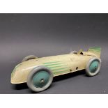 A Chad Valley clockwork tinplate model of a landspeed record breaking car.