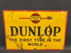 A Dunlop Stock 'The First Tyre In The World' rectangular enamel sign, dated 1929, 30 x 20".