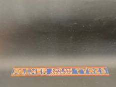 A Palmer Tyres shelf strip.