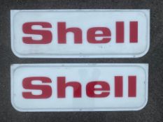 A pair of Shell lightbox panels, each 42 1/2 x 15".