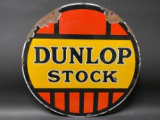 A Dunlop Stock circular enamel sign, 24" diameter.